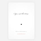 A minimalist art print  greeting card with rounded corners, featuring the quote 'You are the stars' in black cursive, a small black heart, and 'She is the ocean.