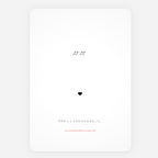 A minimalist Love's Shadow greeting Card white art print with black quote reading '11.11' near the top, a small black heart in the center, and 'She is the ocean.